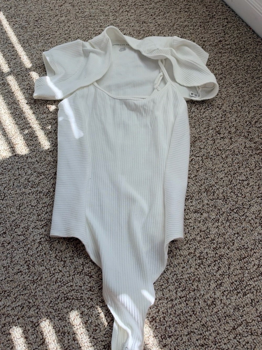 Women’s White Ribbed One-Piece Bodysuit